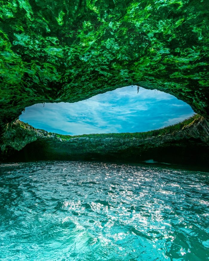 Explore the stunning natural beauty of the Hidden Beach in Marietas Islands, Mexico, with its unique cave opening.