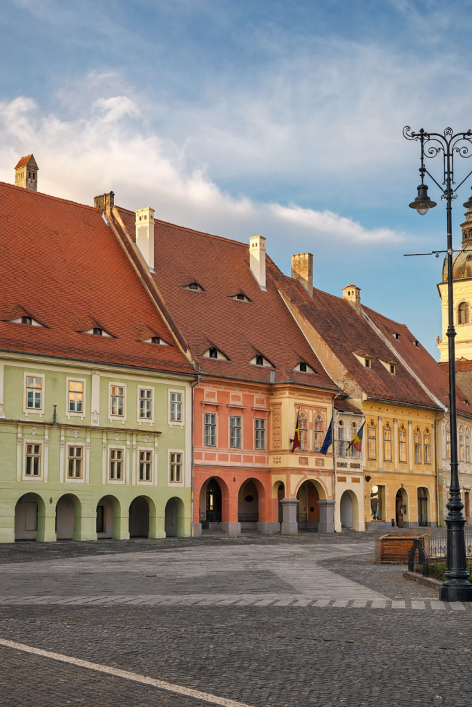 Sibiu, Romania - Hidden Gem | Tripvorra Sibiu, Romania - pastel Transylvanian Saxon square