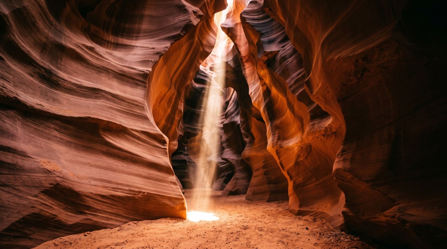 A beam of sunlight cutting through the narrow sandstone walls of Antelope Canyon, Arizona